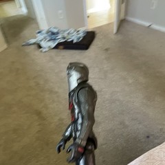 Black, Red & Silver Armored Helmeted Action Figure Character Figure