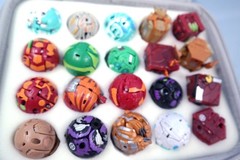 24pc Bakugan Toy Figures with Cards & Chip in Case