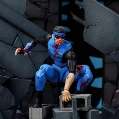 Jada Toys SDCC 2026 Exclusive Invincible Battle Damaged Deluxe Figure In Hand