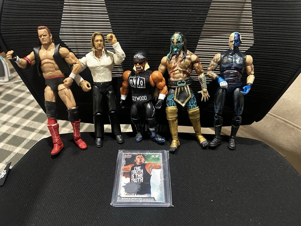 WWE/AEW Action Figure Lot Hulk Hogan, Triple H, Undertaker, Etc