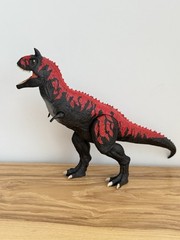 Legacy Collection Reimagined Roarin’ Real Feel Carnotaurus Action Figure – WORKS