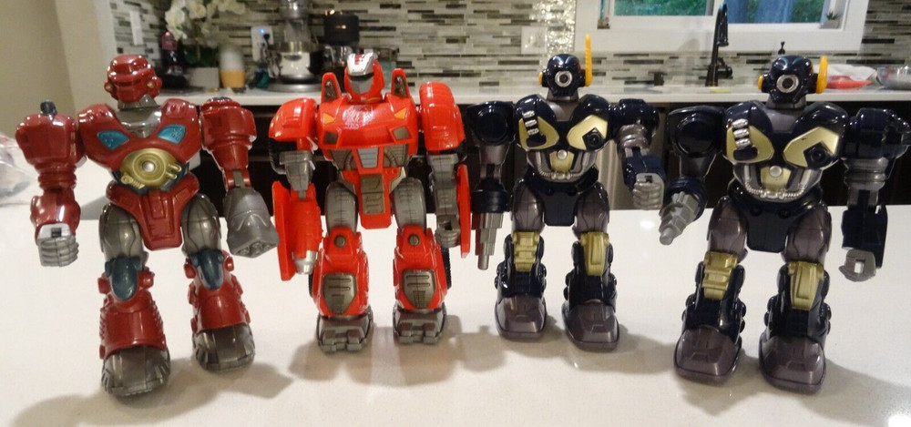 Lot Of 4 VINTAGE HAP-P-KID WALKING LIGHT UP M.A.R.S. 7″ ROBOT ACTION FIGURES C#4