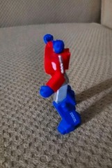 2 1/2″ Plastic Red Silver+Blue Optimus Prime Mini Transformer Action Figure Toy