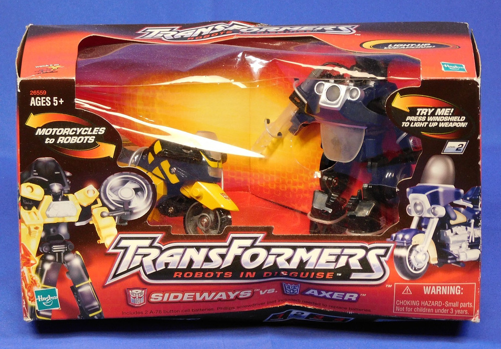 TRANSFORMERS RID SIDEWAYS VS AXER 2001 SEALED IN ROUGH BOX HASBRO