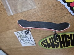 Cash Wood fingerboard complete with Urethane bearing wheels Flatface Stickers
