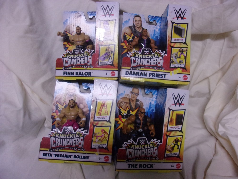 WWE Knuckle Crunchers. Rollins, The Rock And Finn Balor. Lot Of 4