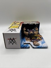 WWE KNUCKLE CRUNCHERS DOMINIK MYSTERIO 3.5″ FIGURE with BREAKABLE BOARD & 2×4
