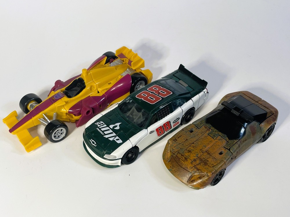 Transformers Combiner Wars Dragstrip, Dark of the Moon Roadbuster, Sparkless Bot