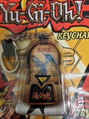 Yu-Gi-Oh! Series 1 Duel Monster Spin Keychain Blue-Eyes White Dragon 1996 – NEW
