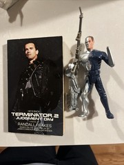 Kenner “Exploding T-1000” action figure from the Terminator 2 – With Book