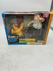 Mezco Family Guy the Giant Chicken vs Peter Figure Set Sealed. Box is damaged.