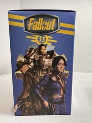 Fallout (TV Series) Cooper Howard Vault-Tec Suit 8″ New Sealed + Metal Sign