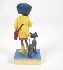 Coraline & Black Cat Heartwood Creek Yellow Raincoat Stone Resin Figure Statue