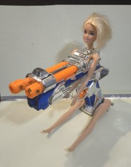 Doll on Blue and Silver Plastic Toy Space Gun. Sid Aardpiggy’s Halloween Story!