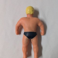 Stretch Armstrong Action Figure Blonde Male Rubber Black Shorts Beige Yellow