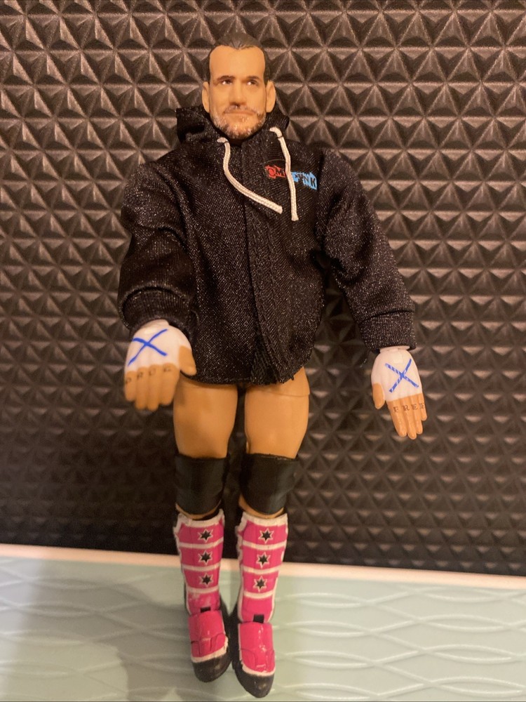 WWE CM Punk Ultimate Edition Series 27 figure 100% Complete.
