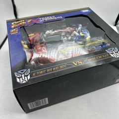Transformers Collaborative Street Fighter II Mash-Up Hot Rod Ken vs Arcee Chun