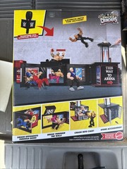 WWE knuckle crunchers microphone Playset with exclusive Final boss The Rock!