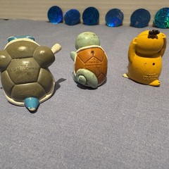 1999 POKÉMON FIGURES AND COINS SET WITH TWO-“RARE” PURPLE AND TRANSLUCENT FIGS