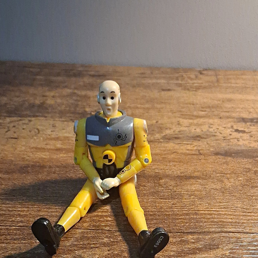 Yellow/Gray/Black Crash Test Dummy Articulated Action Figure – Plastic