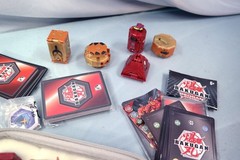 24pc Bakugan Toy Figures with Cards & Chip in Case