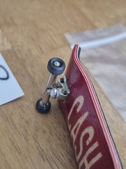 Cash Wood fingerboard complete with Urethane bearing wheels Flatface Stickers