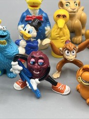 Lot 14 Vintage Character Figurines Sesame Street Disney Garfield Raisin PVC Toys