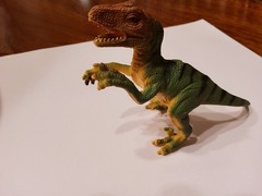 velociraptor action figure 5 1/2 inches. Made in china