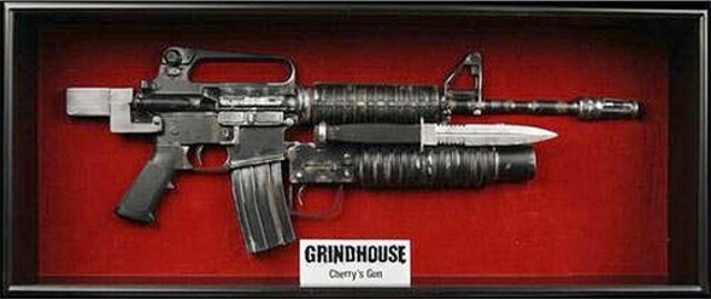 Planet Terror Grindhouse RARE “Cherry’s” Leg Gun & Display Case.