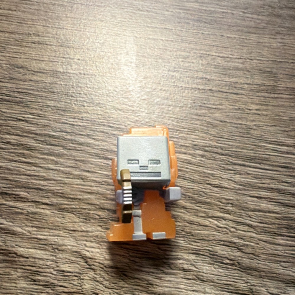 Orange Silver Robot Figurine Articulated Plastic Collectible Toy
