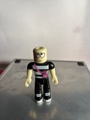 5- ROBL0X Jazwares LLC Boy Figure. 2 1/2”