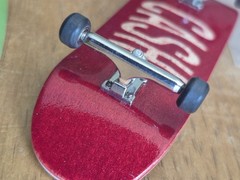 Cash Wood fingerboard complete with Urethane bearing wheels Flatface Stickers