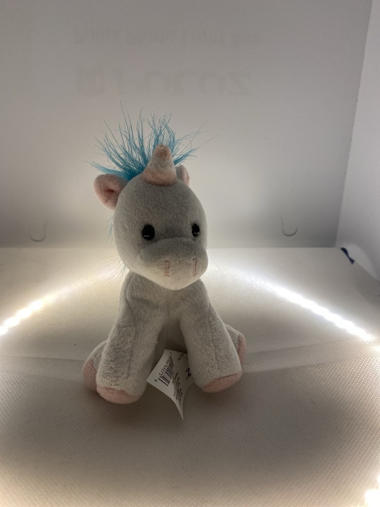 Little white pink and blue unicorn