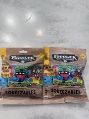 Set of 2 -Mini Fuggler Squeezable Soft Rising Foam Stress Relief Toy Mystery Bag