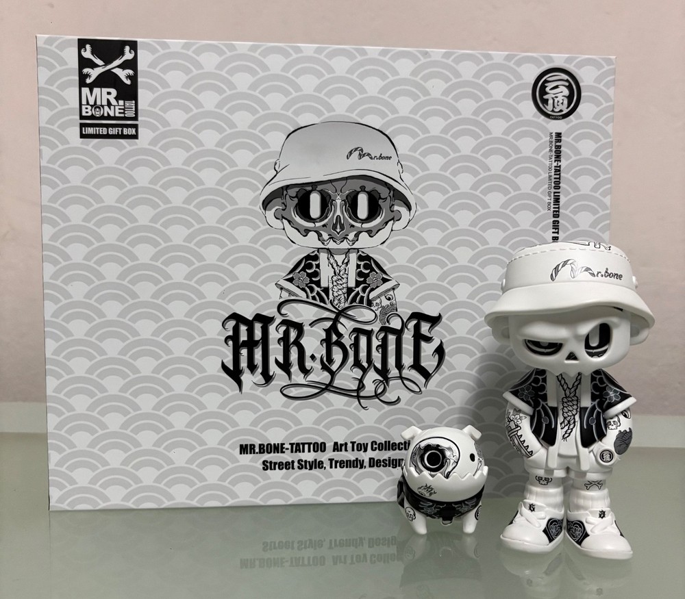 The Mr. Bone Tattoo 100% is a 2025 limited-edition collectible art toy