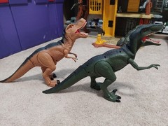 Mighty Megasaurs Electronic Walking T-Rex & Velociraptor – Roars Lights Up