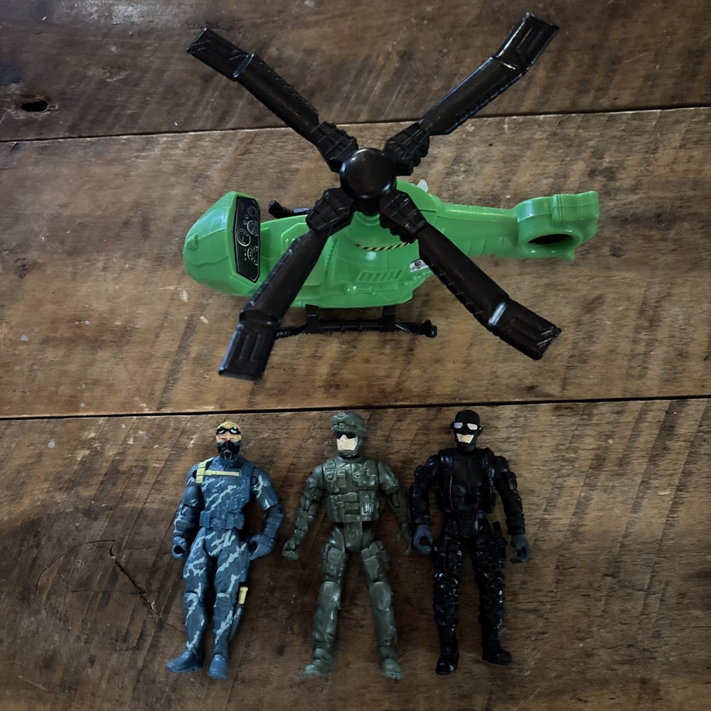 Three Action Figure Soldiers And A Chopper Accessory