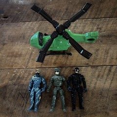 Three Action Figure Soldiers And A Chopper Accessory