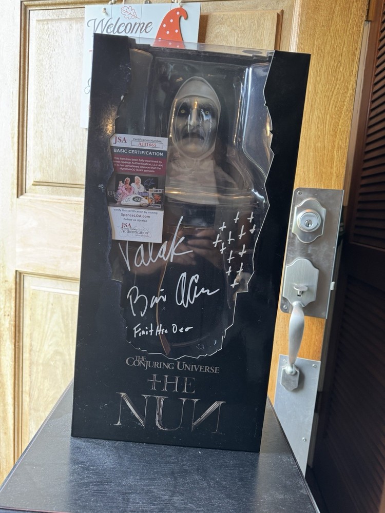 the nun signed figure