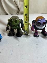 Lot of 4 Uncle Milton’s P-Brains Figurines 2004. Baby, Teacher, Soldier, Skater