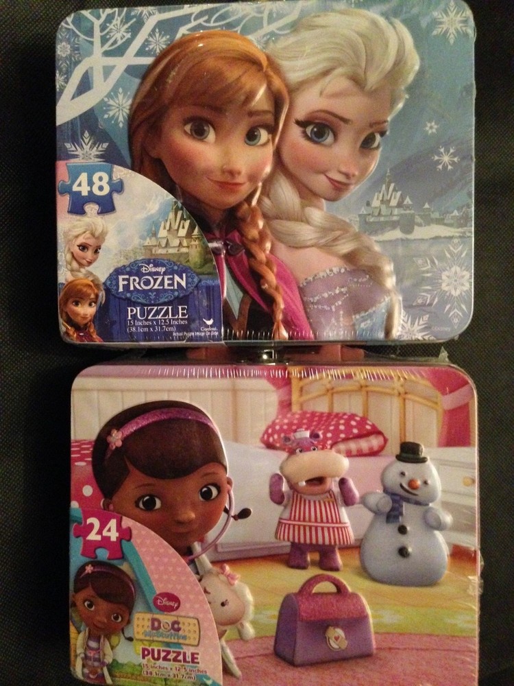 Disney “Frozen” & “Doc McStuffens” 48 Pc Puzzles in Lunch Boxes, Both Brand New!