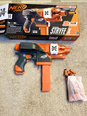 Nerf Pro Stryfe X Dart Blaster: Battery, 30 HL Darts, Magazine, Glass & Charger.