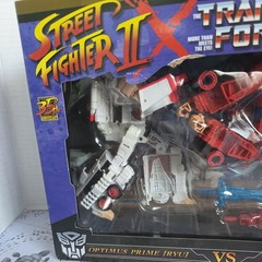 TRANSFORMERS X STREET FIGHTER II OPTIMUS PRIME RYU VS. MEGATRON M. BISON TAKARA