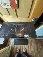 the nun signed figure