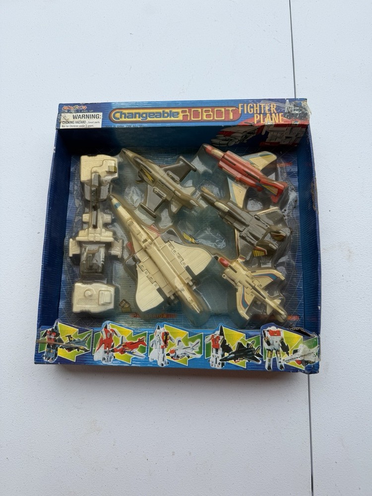 NIB Changeable Robot Fighter Plane See Details