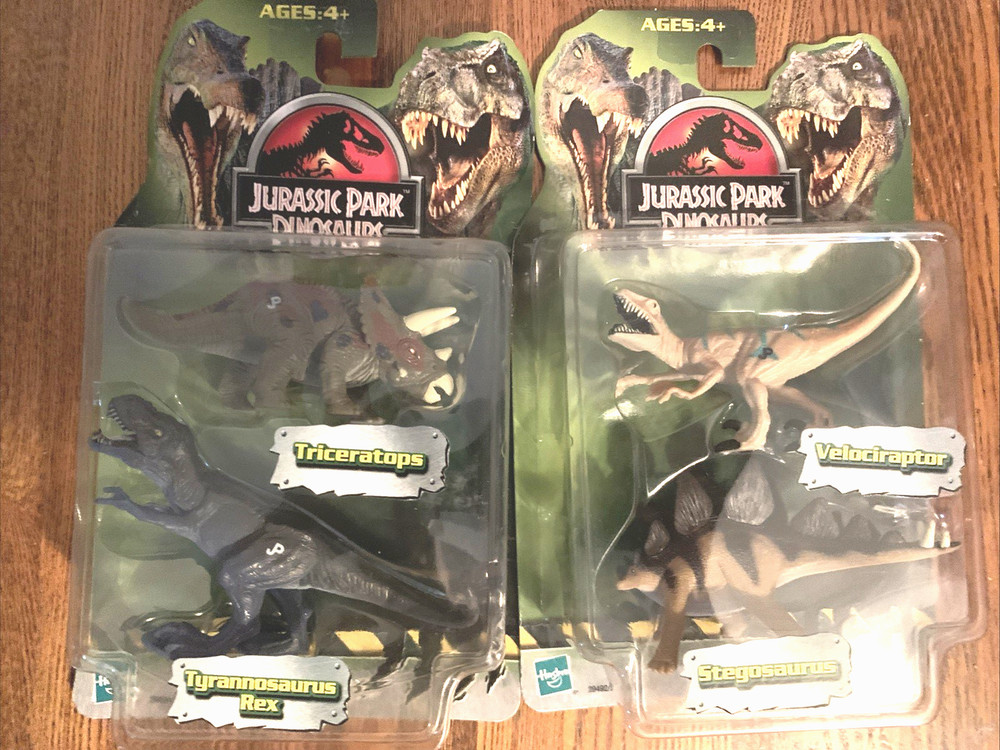 JURASSIC PARK VELOCIRAPTOR STEGOSARUS TRICERATOPS TYRANNOSAURUS REX 2005