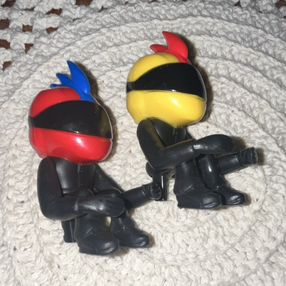 2-Piece Helmeted Plastic Figure Set, Black with Red & Yellow Helmets