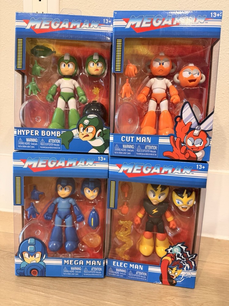 (4) Jada Mega Man’s Toys Of CUT MAN,MEGA MAN,HYPER BOMB,ELEC MAN – SEALED