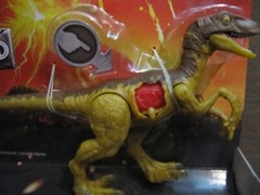 Jurassic World Battle Damage Velociraptor Figure – Brand NEW in Package