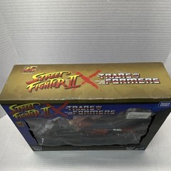Takara Tomy Hasbro Transformers Street Fighter Optimus Prime vs Megatron Boxed …